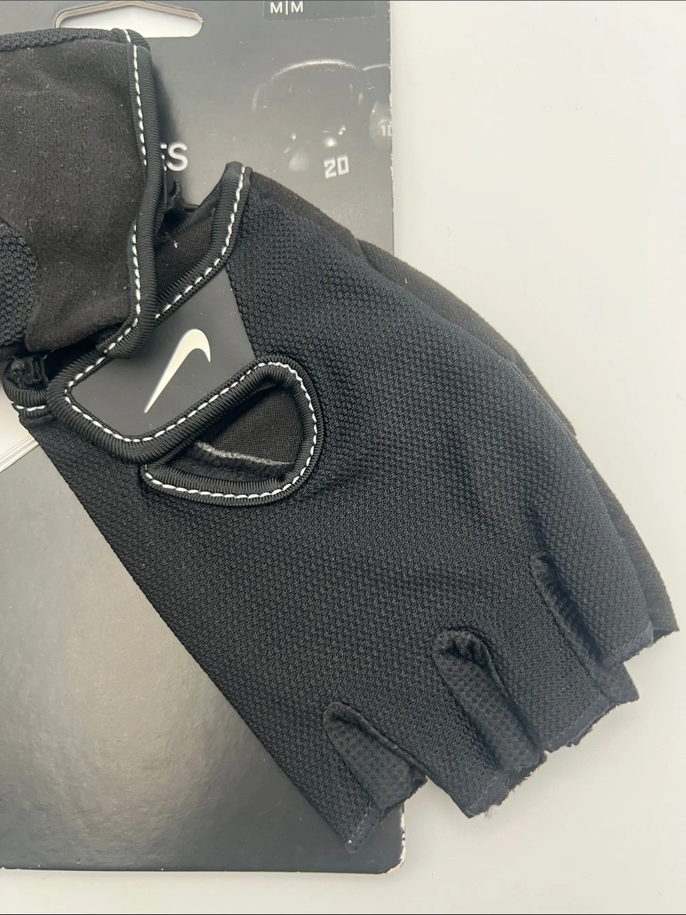 Nike Women's Black Fingerless Workout Gloves with White Swoosh